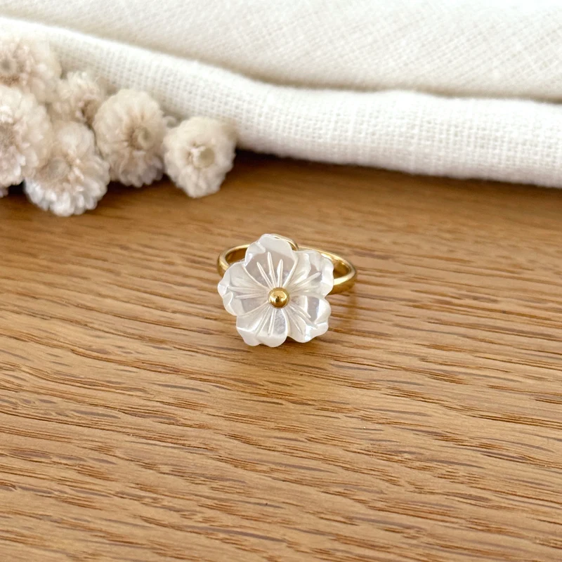 Bague tournante "Fleur nacre" acier