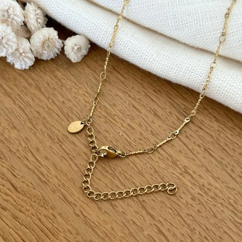 Collier "Coquillage" blanc acier
