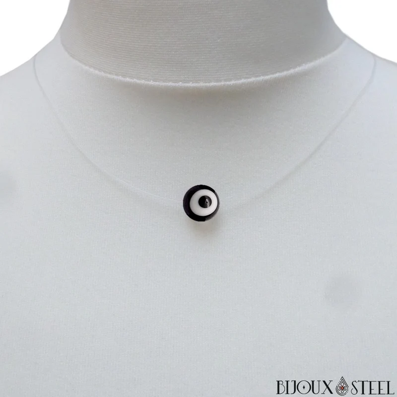 Collier à perle mauvais oeil noir et blanc sur fil de nylon