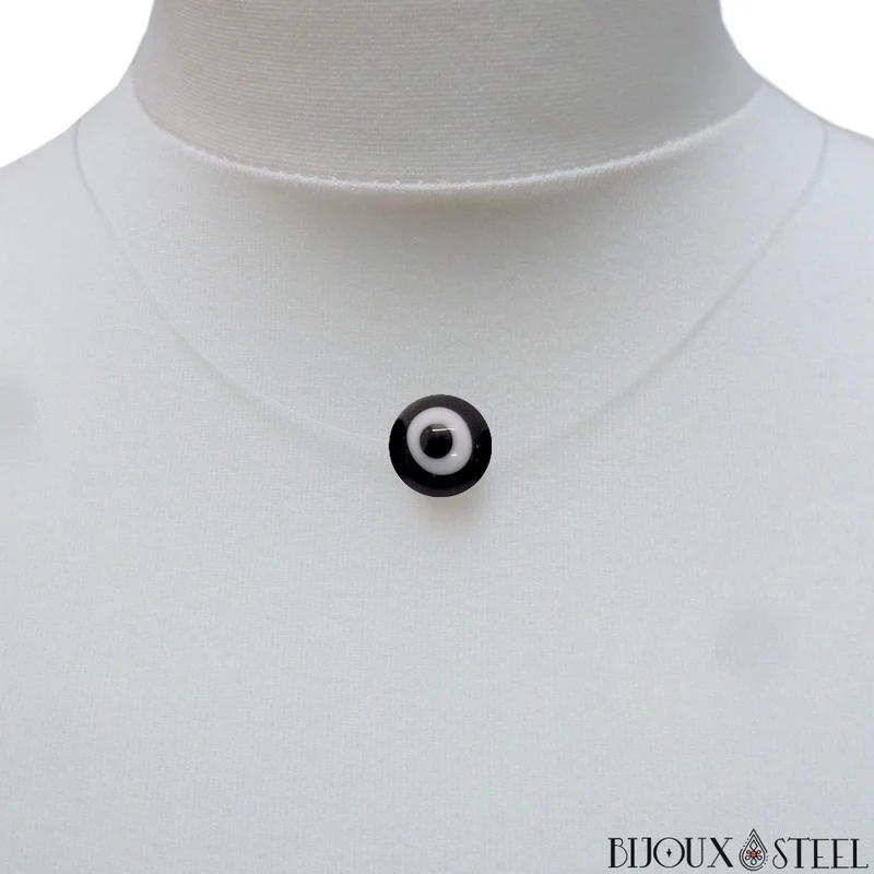 Collier à perle mauvais oeil noir et blanc sur fil de nylon