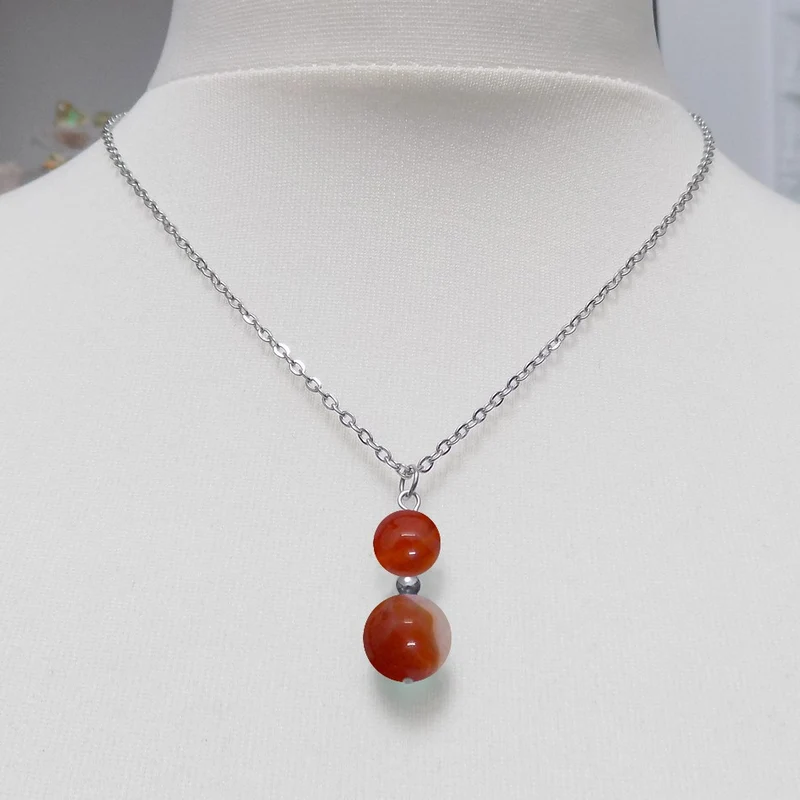 Collier à pendentif deux perles en pierre d'agate rouge