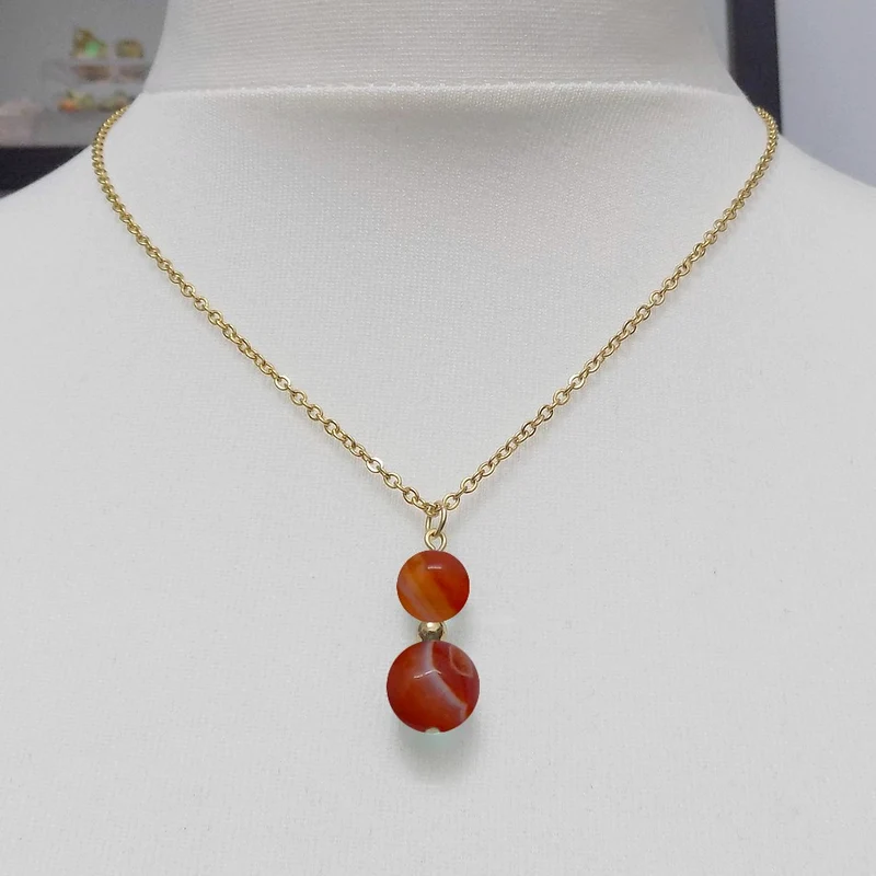Collier à pendentif deux perles en pierre d'agate rouge