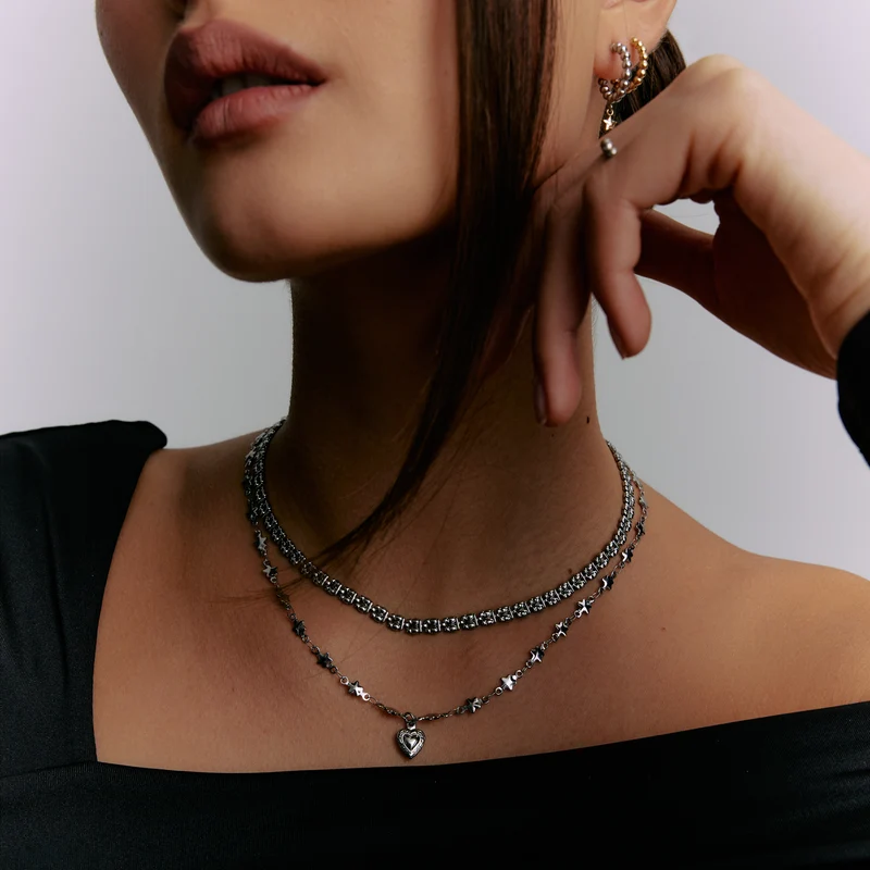 Boucles d'oreilles étoiles dorées ornées de perles