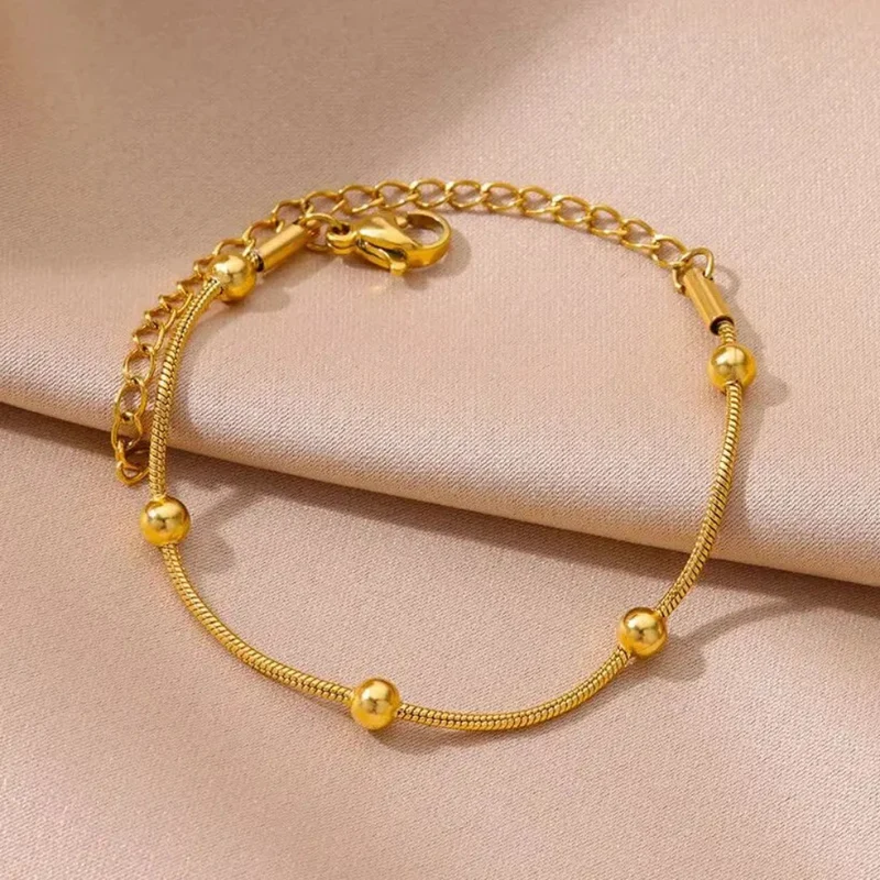 Bracelet Or avec Boules Dorées