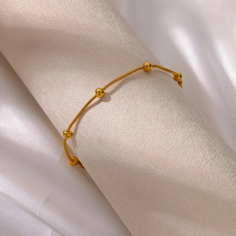 Bracelet Or avec Boules Dorées