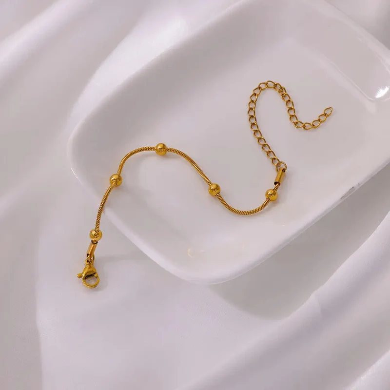 Bracelet Or avec Boules Dorées