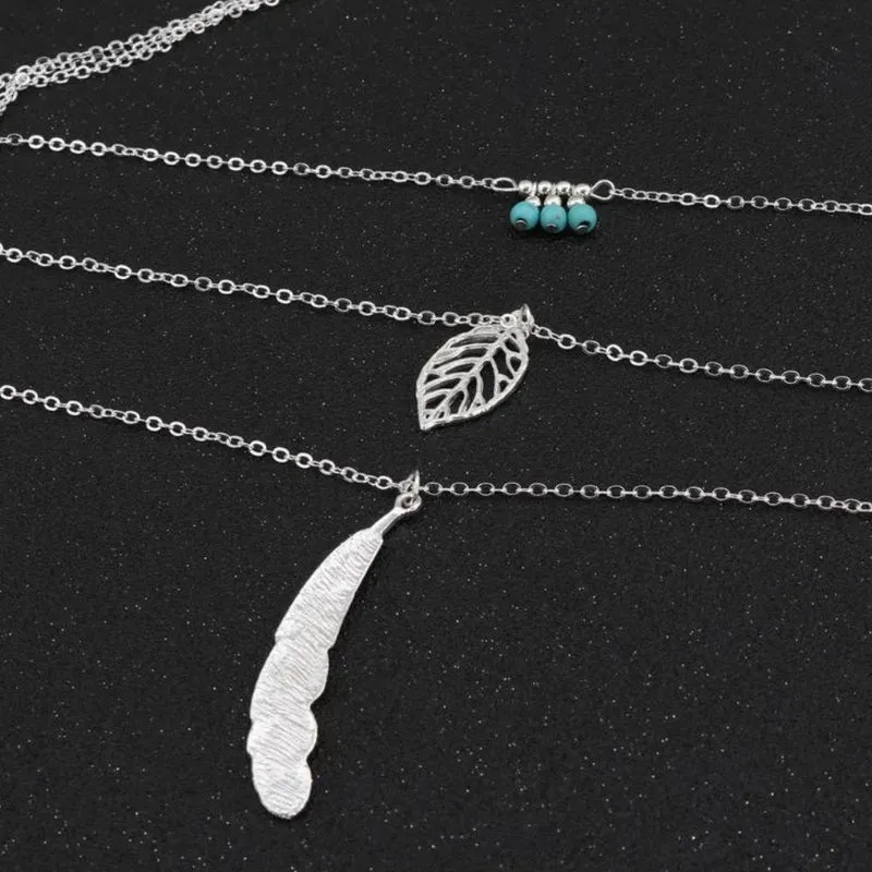 Ensemble Colliers Plume