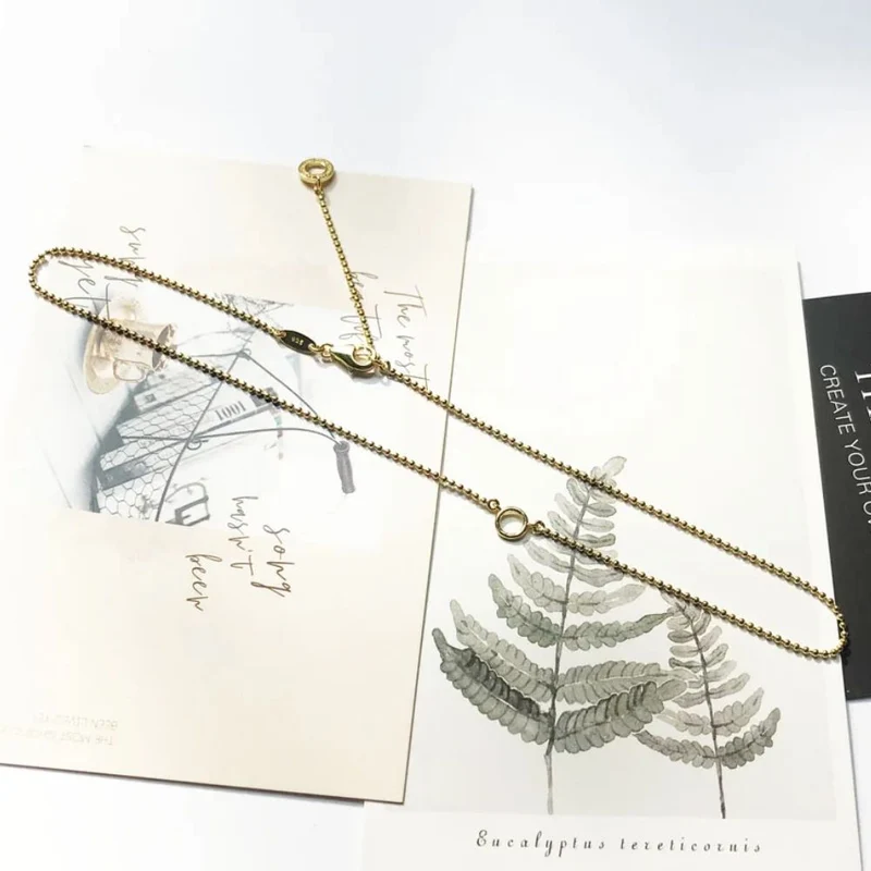 Collier Plume doré