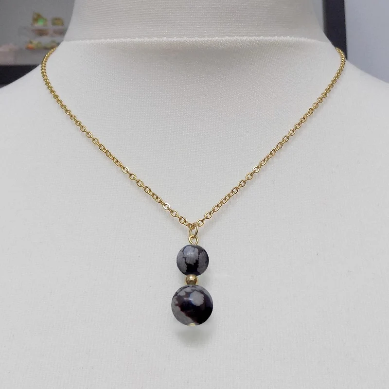 Collier à pendentif deux perles en pierre d'obsidienne flocon de neige