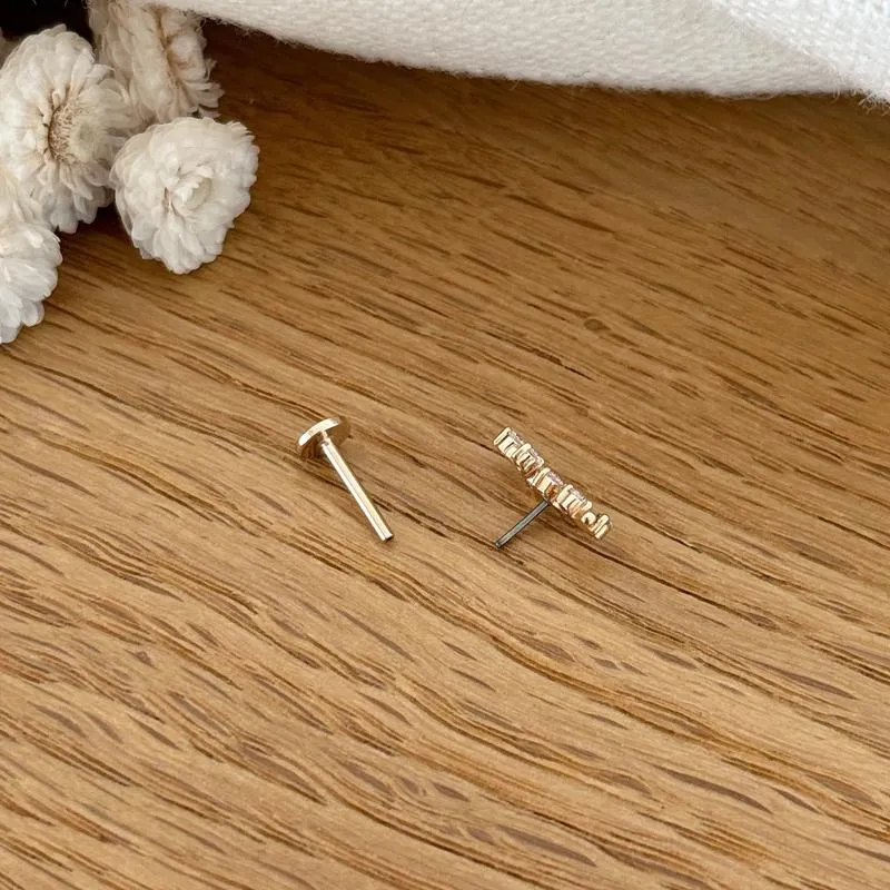 Piercing oreille "Fila" plaqué or
