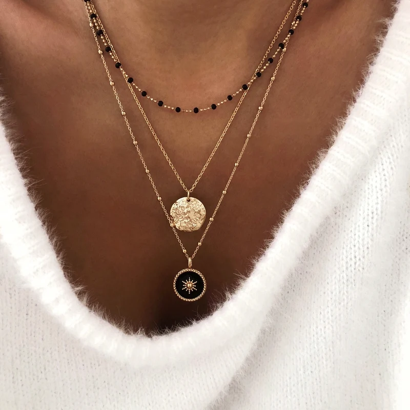 Collier "Soleil" noir plaqué or