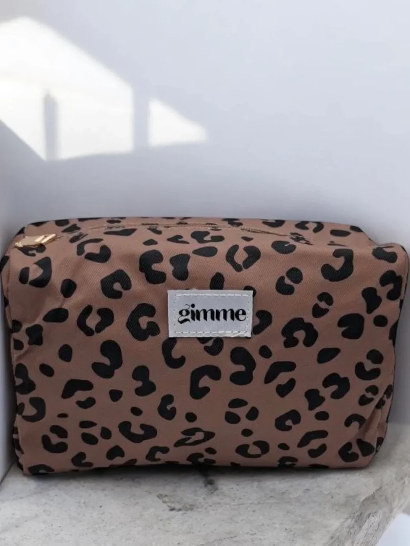 Pochette imperméable léopard à fermeture dorée