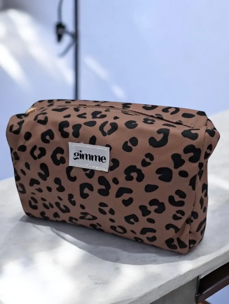 Pochette imperméable léopard à fermeture dorée