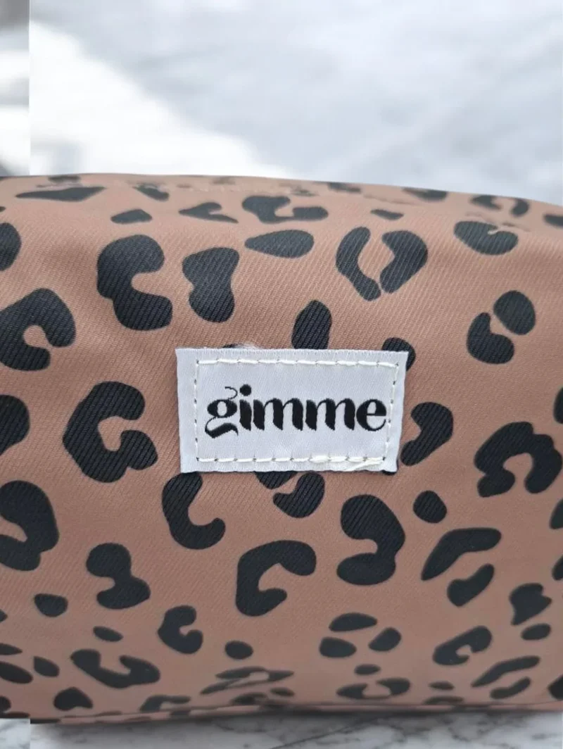 Pochette imperméable léopard à fermeture dorée
