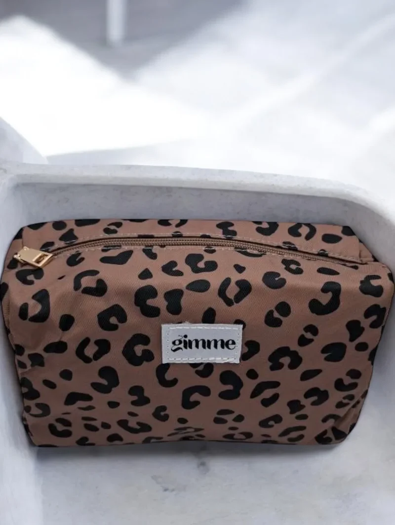 Pochette imperméable léopard à fermeture dorée
