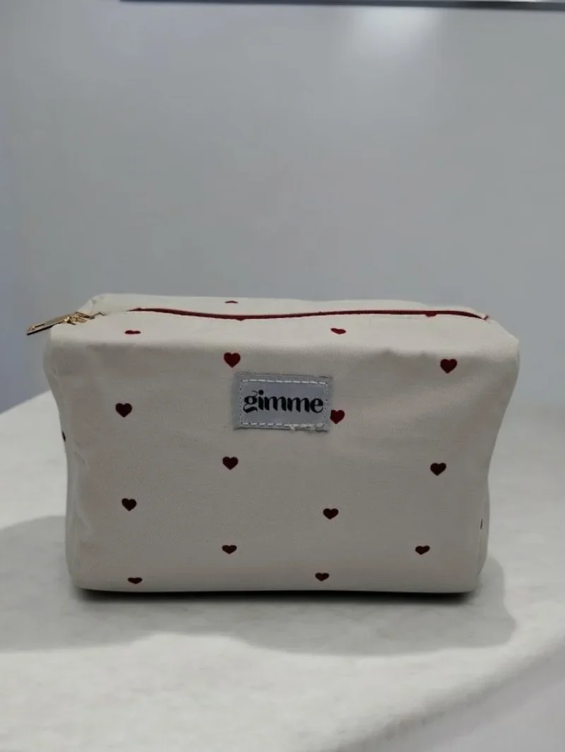 Pochette trousse imperméable blanche à cœurs rouges