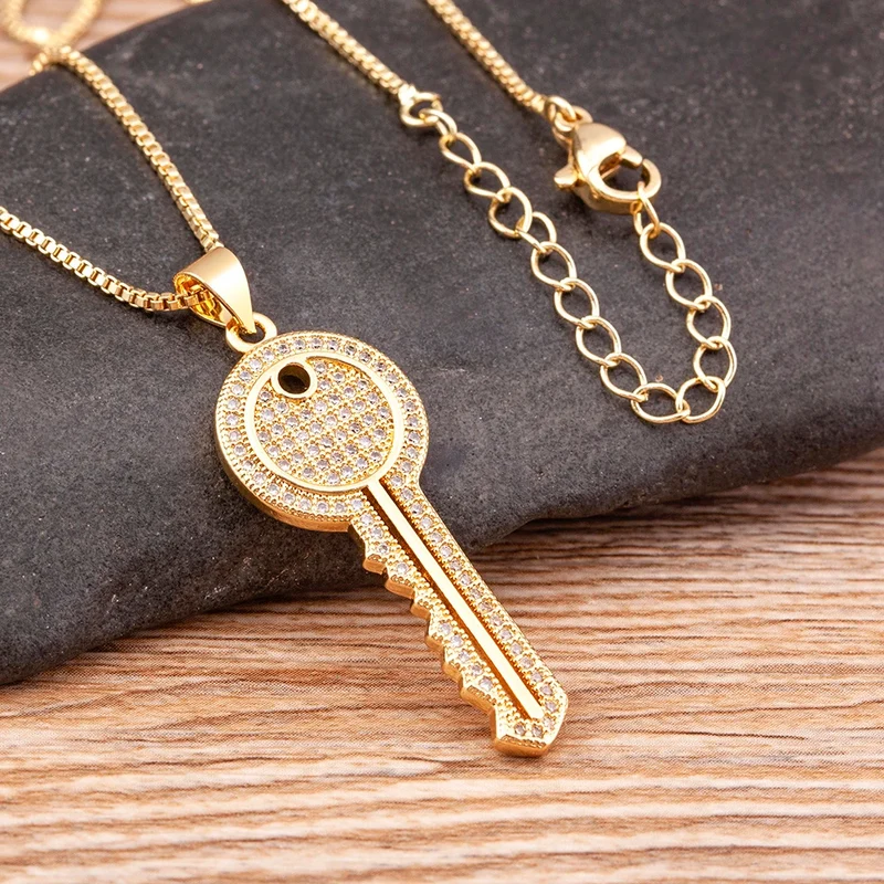 Collier Clé Doré