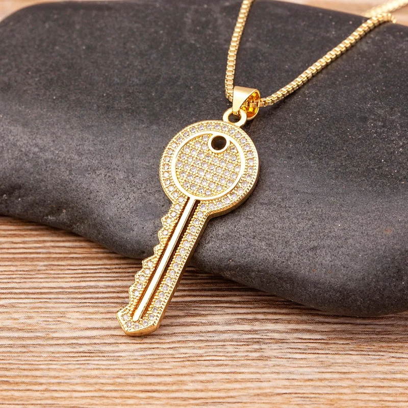 Collier Clé Doré
