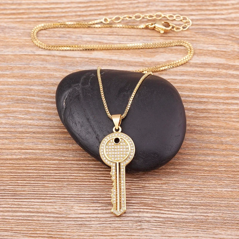 Collier Clé Doré