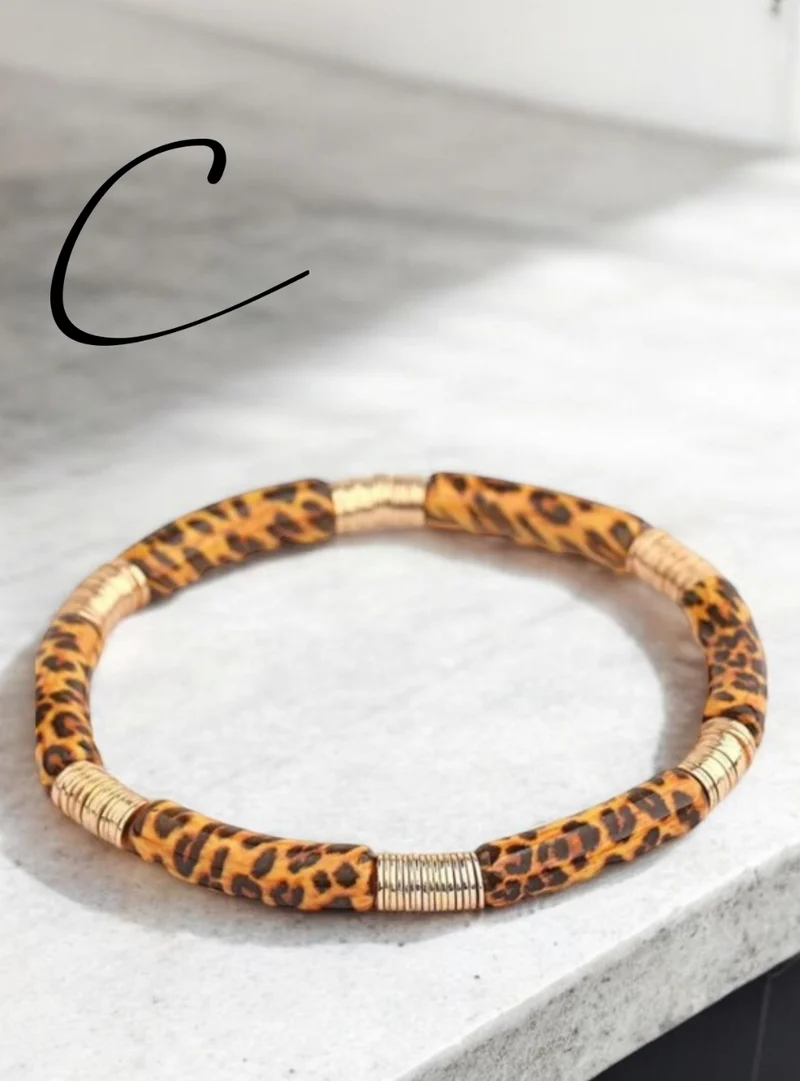Bracelet élastique motif léopard doré 5 modèles