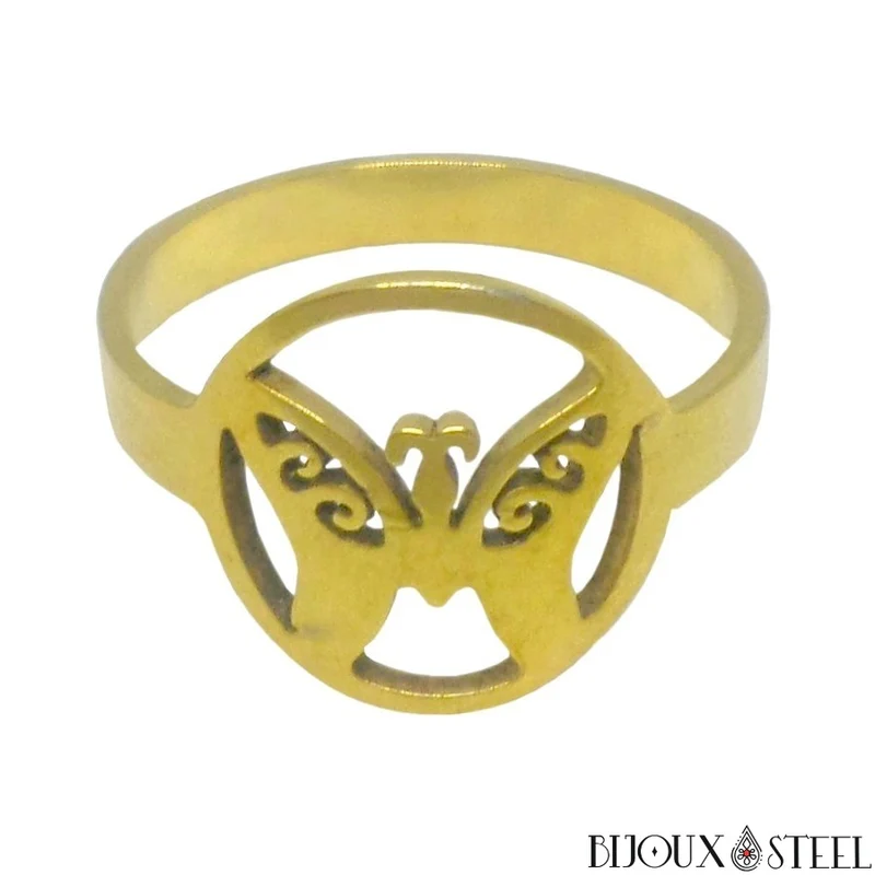 Bague dorée à papillon encerclé en acier chirurgical