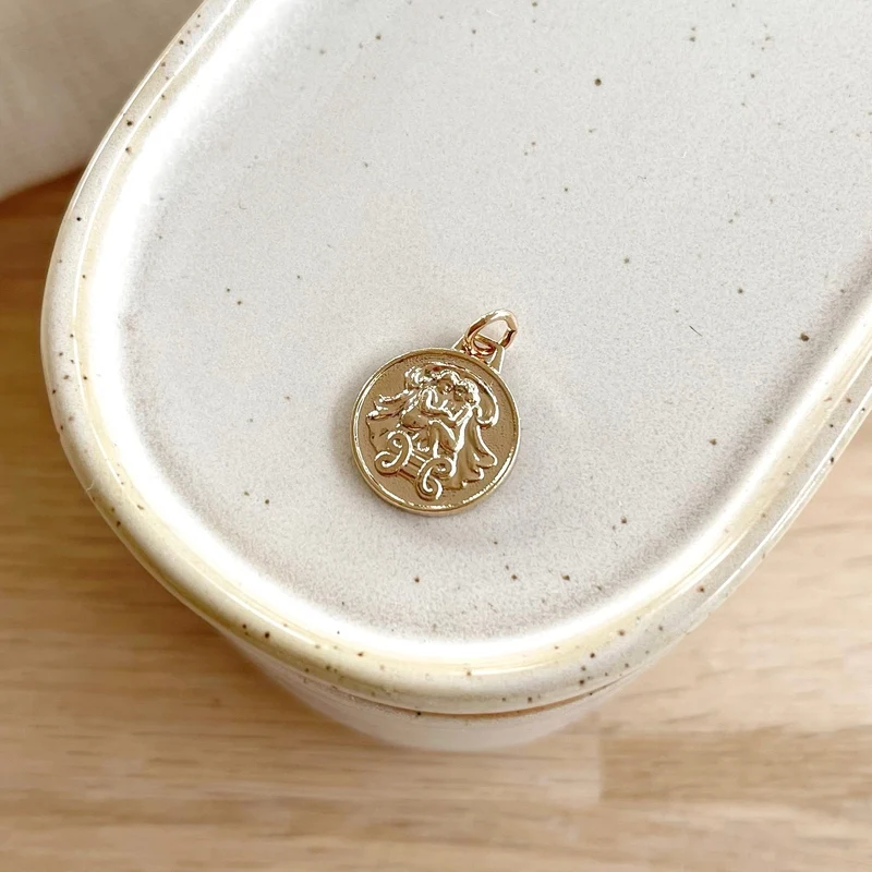 Pendentif médaille "Astro" plaqué or