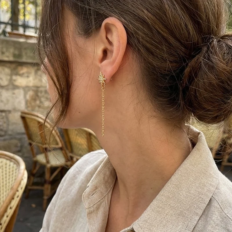 Boucles d'oreilles étoile en cristal avec chainette