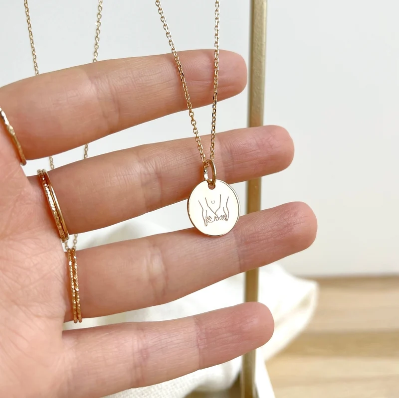 Collier "Main dans la main" plaqué or