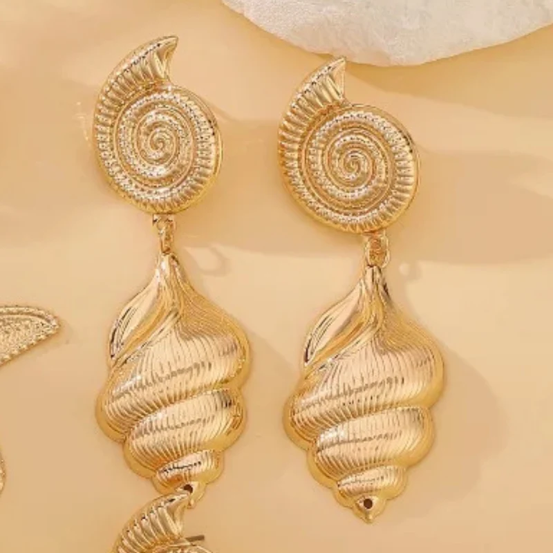 Boucles d'Oreilles Pendante Coquillage Spirale