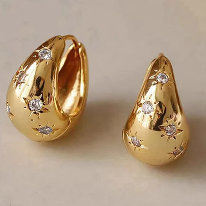 Boucles d'Oreilles Grosse Créole Étoile