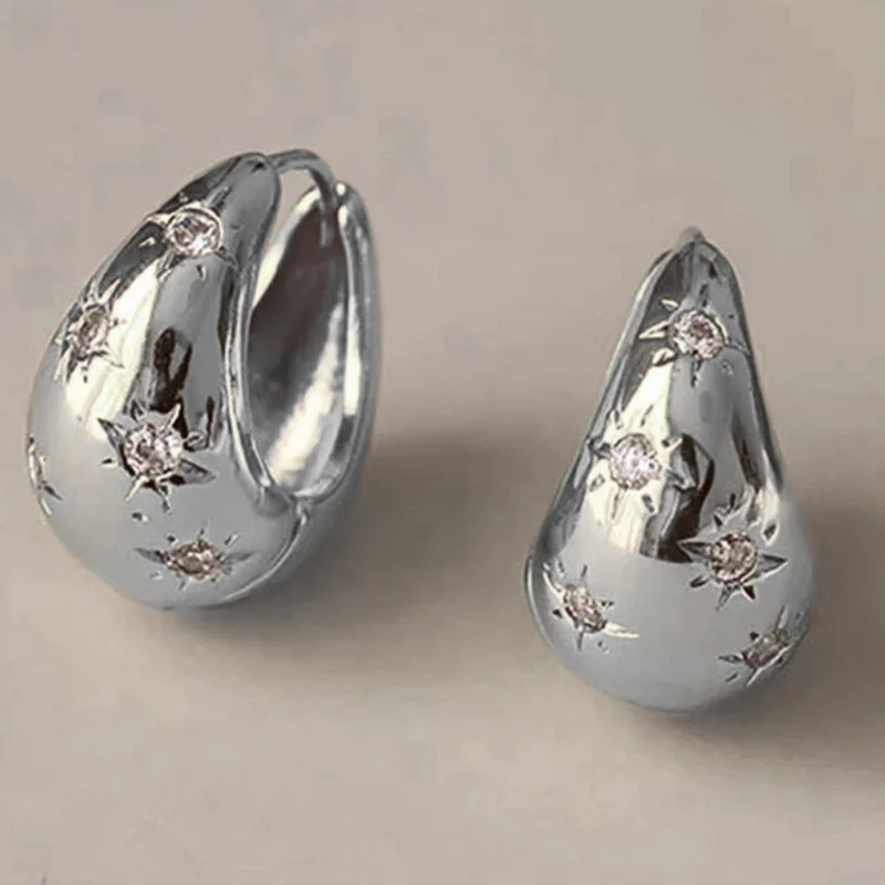 Boucles d'Oreilles Grosse Créole Étoile