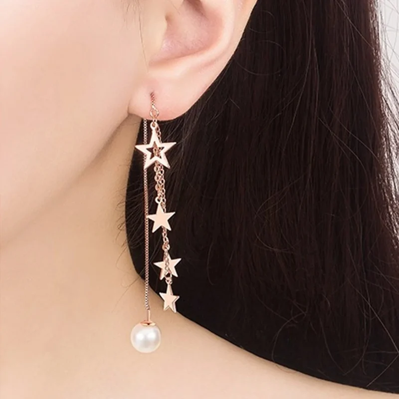 Boucles d'Oreilles Triple Étoile Pendante