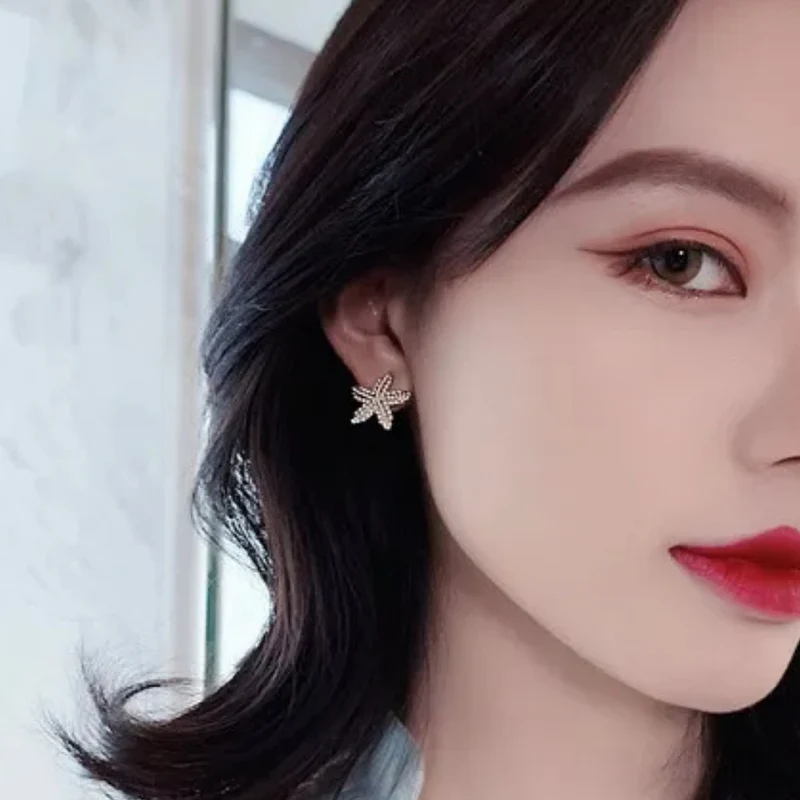 Boucles d'Oreilles Étoile de Mer Perle Blanche