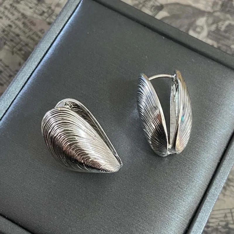 Boucles d'Oreilles Moules