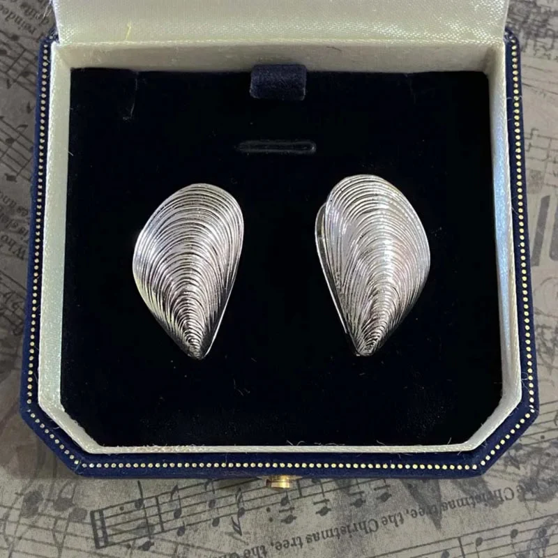 Boucles d'Oreilles Moules