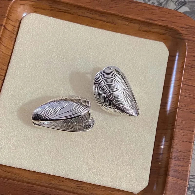 Boucles d'Oreilles Moules