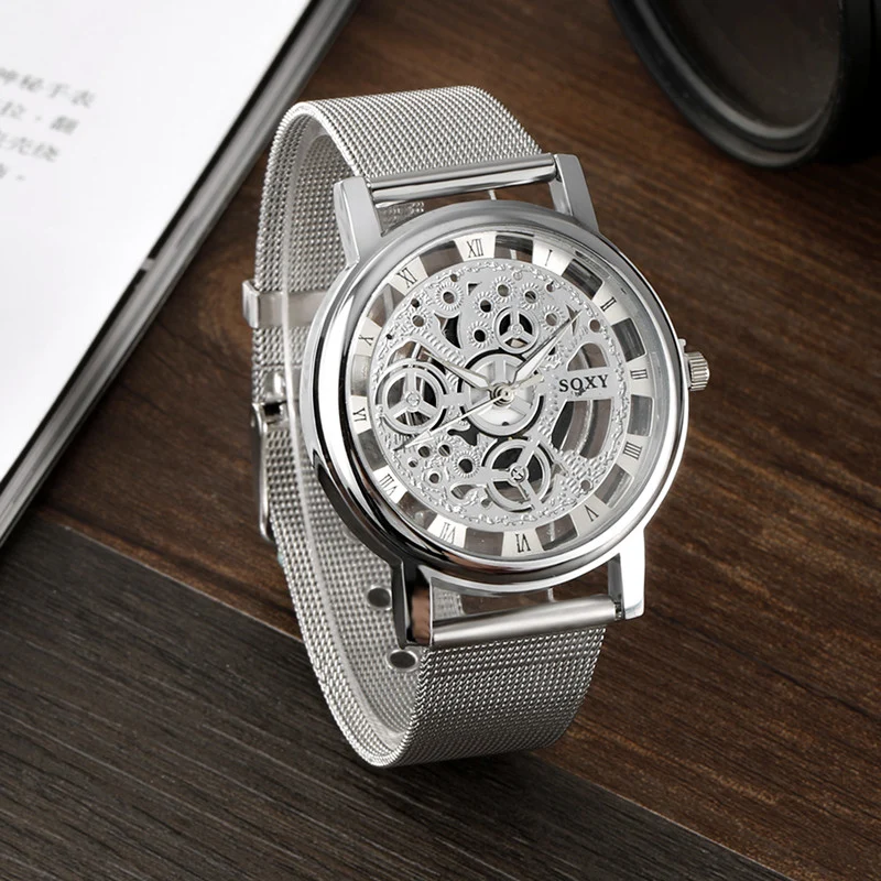 MONTRE CADRANT TRANSPARENT ARGENTÉ